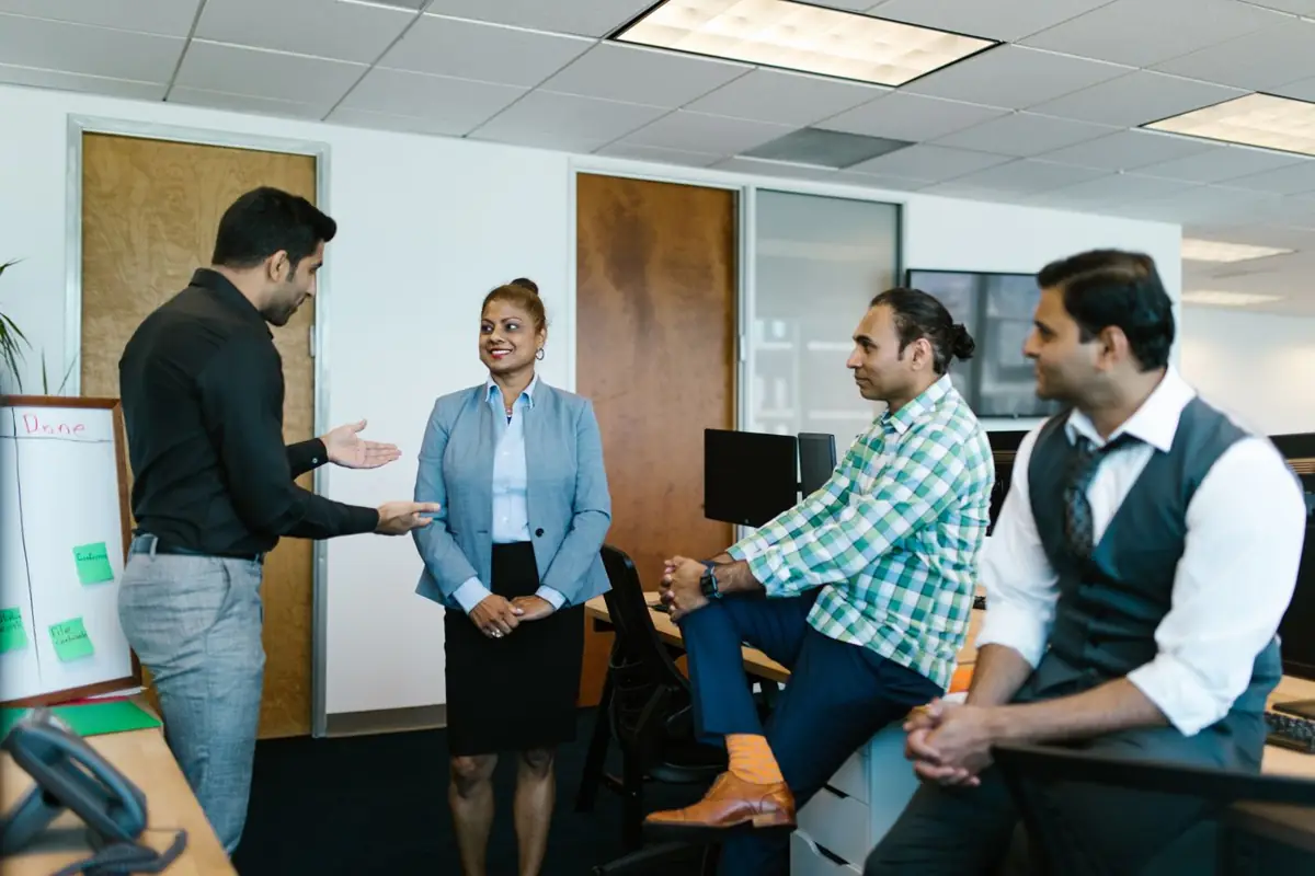 Advisors discussing a transaction with the client team